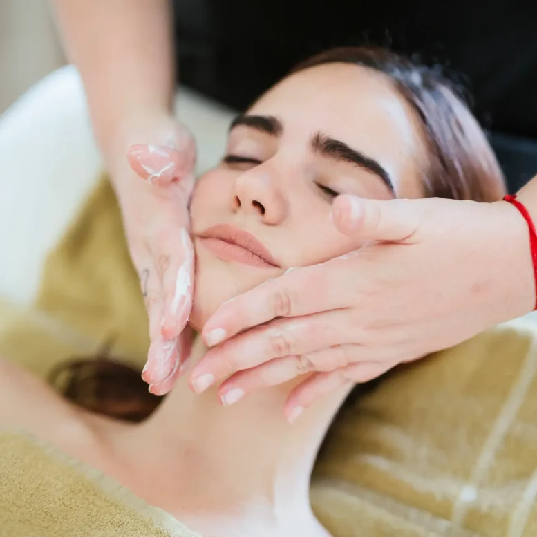 young-woman-receiving-facial-beauty-treatment-in-a-2024-09-13-21-42-44-utc